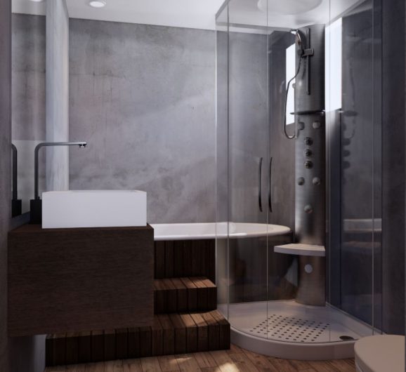Baño con cabina de vapor y regadera, piso tipo madera y lavabo sobre cubierta. Diseño interior por MMS Arquitectos en Estado de México y Ciudad de México