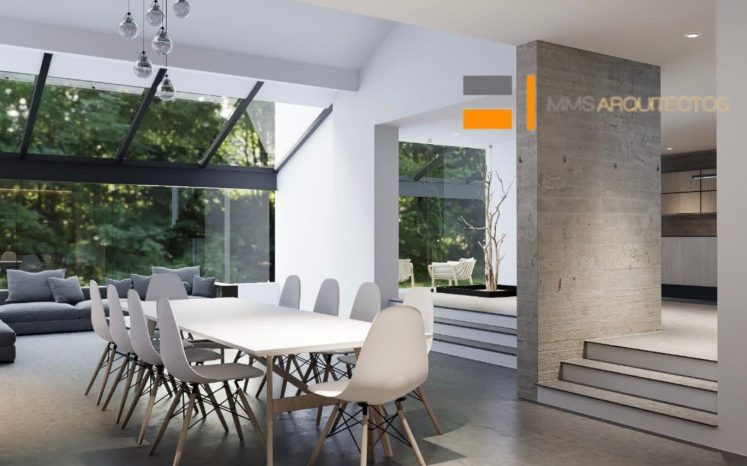 Comedor minimalista de 10 personas integrado con sala y ventanales al jardín. Diseño interior por MMS Arquitectos en Estado de México y Ciudad de México